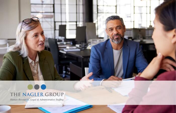 people talking at a table